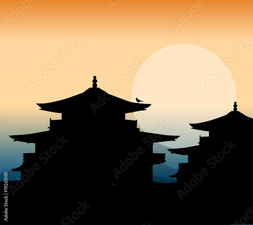 wooden pagoda at sunset in china
