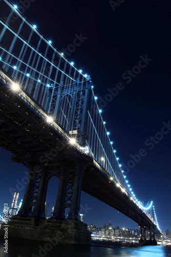 New York City Skyline and Manhattan Bridge At Night #19263513