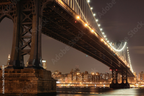 New York City Skyline and Manhattan Bridge At Night © Joshua Haviv