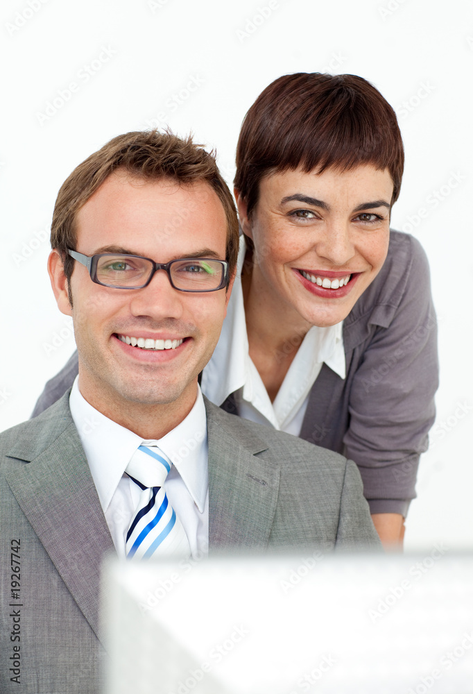Assertive manager checking her employee's work Assertive manager checking her employee's work
