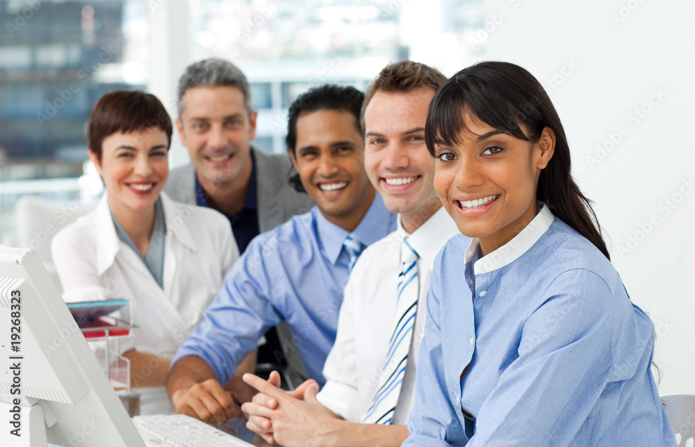 A business group showing diversity looking at the camera A business group showing diversity looking at the camera