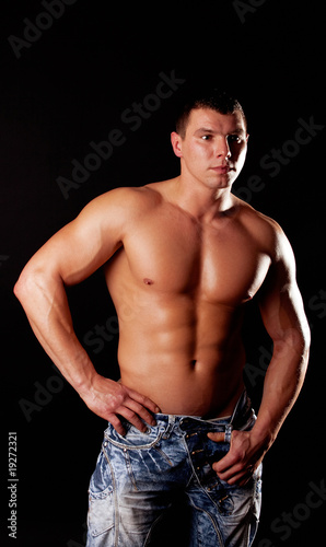 handsome muscular guy posing