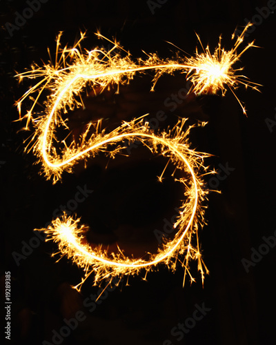 Digit 5 made of sparklers