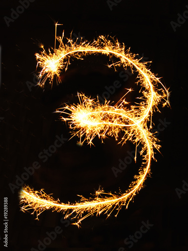 Digit 3 made of sparklers