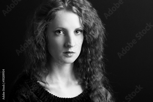 The beautiful girl with curly hair © Oleg Gekman