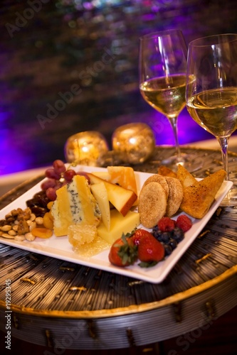 Cheese and fruit plate with honeycomb