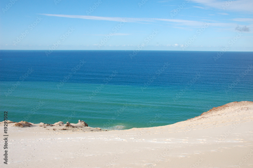 Azure ocean with sand beach