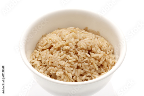 Bowl of rice on a table.