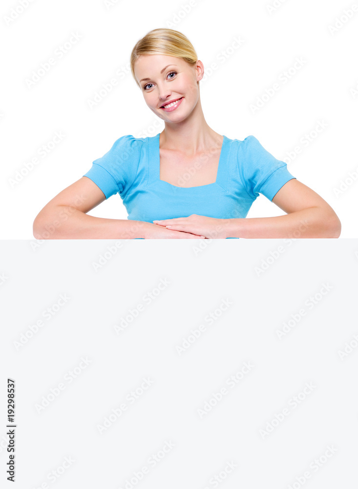 happy smiling blond female under the white billboard happy smiling blond female under the white billboard