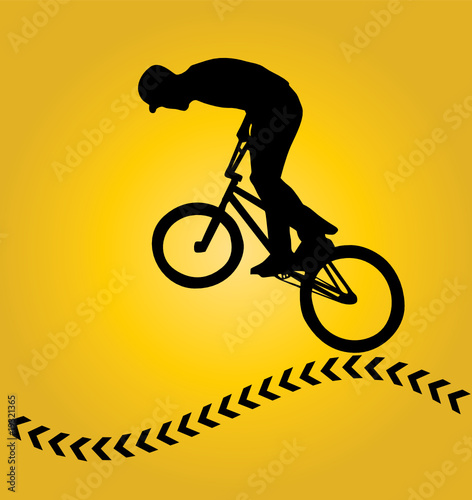 Bmx rider cyclist silhouette isolated on yellow