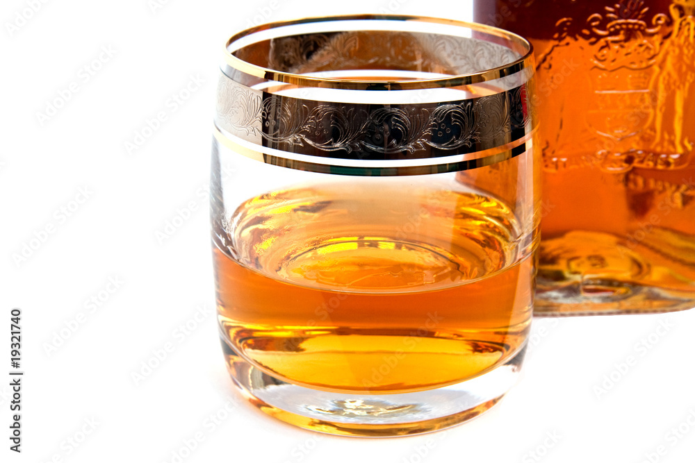 glass of whiskey with a bottle glass of whiskey with a bottle