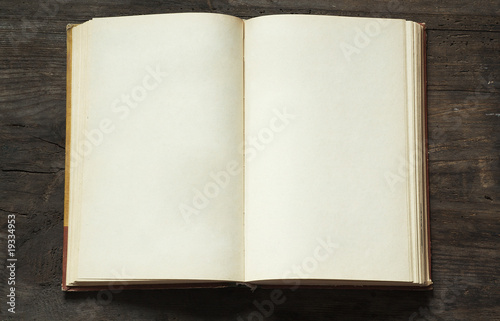 blank open book on wooden background