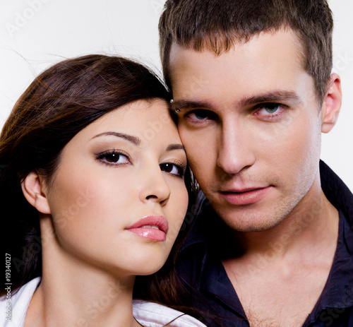 Close-up portrait of a beautiful brunette couple