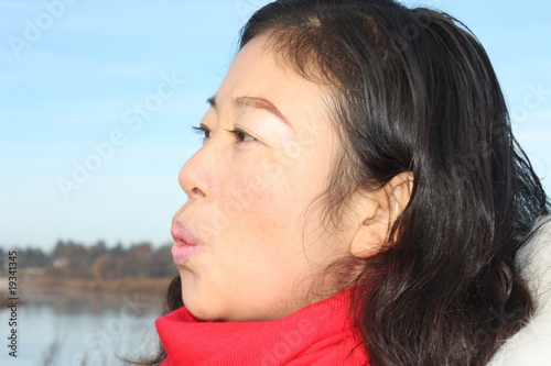 Chinese girl whistling