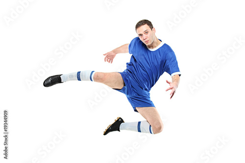 Footballer in a jump isolated on white background © Ljupco Smokovski