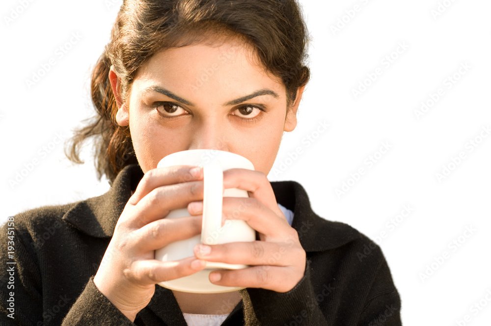 Cheerful business woman holding coffee cup. Cheerful business woman holding coffee cup.
