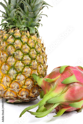 Pineapple and dragon fruit close-up photo