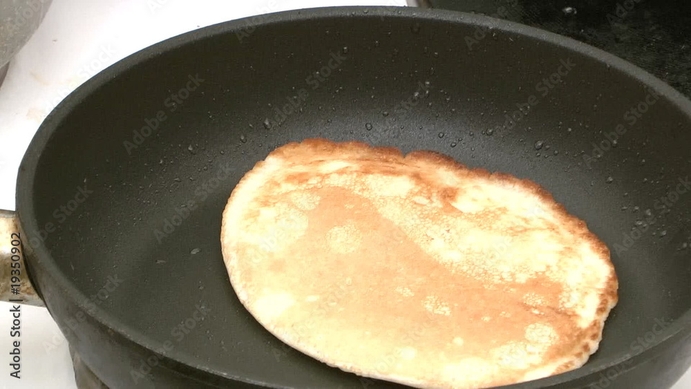 To bake a pancake on a frying pan. Timelapse. To bake a pancake on a frying pan. Timelapse.