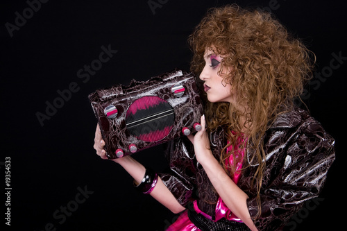 Retro girl with handbag like radio