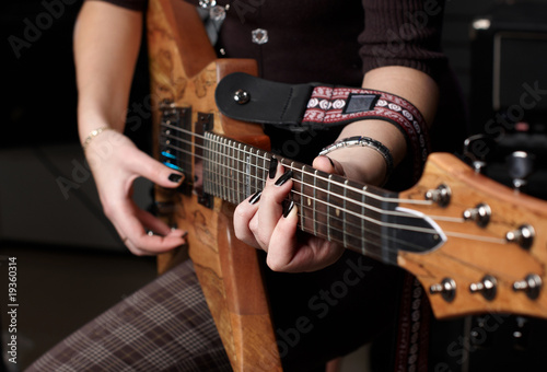 hands on guitar