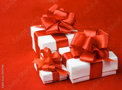 White box on a red background with a red ribbon