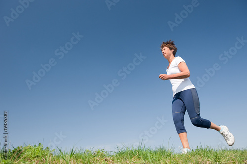 Running senior woman
