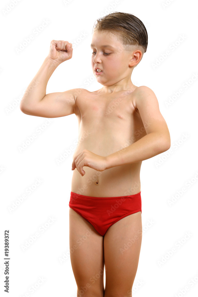 Obraz premium Boy flexing biceps muscles