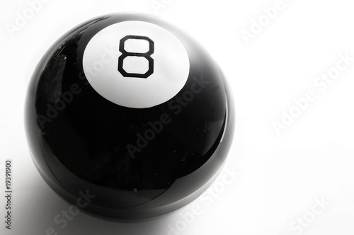 closeup of a billiard 8 ball, on white
