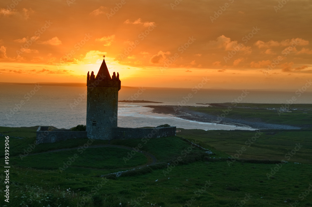sunset capture of a old irish castle on west coast of ireland