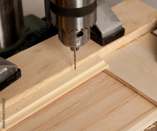 Drilling small hole in wood
