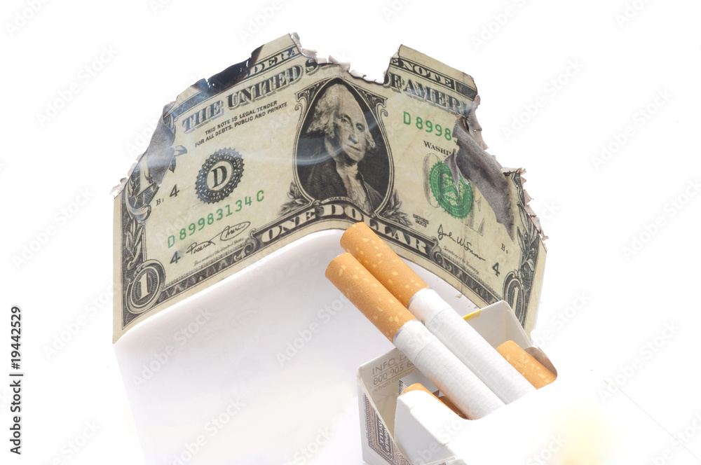dollaro che brucia e sigarette