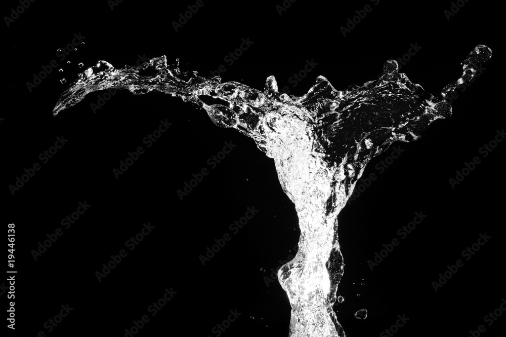 Stylish water splash. Isolated on black background