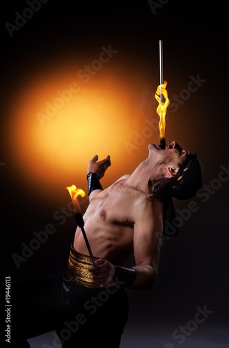 Fire show with torches photo