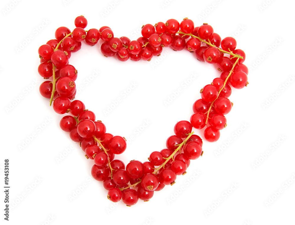 red berries in the shape of hearts over white background red berries in the shape of hearts over white background