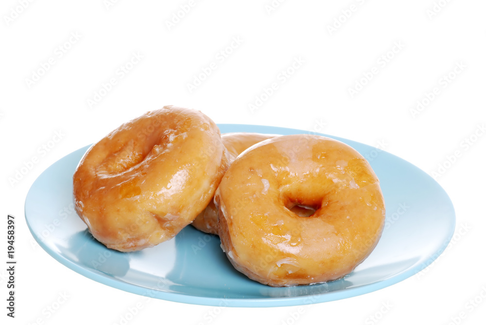 Glazed Donuts On Blue Plate