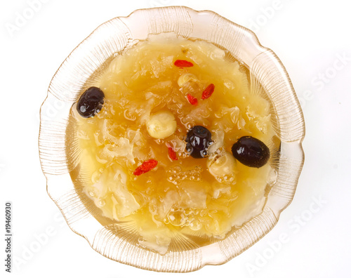 Chinese Lotus seed soup. Close up on white background photo