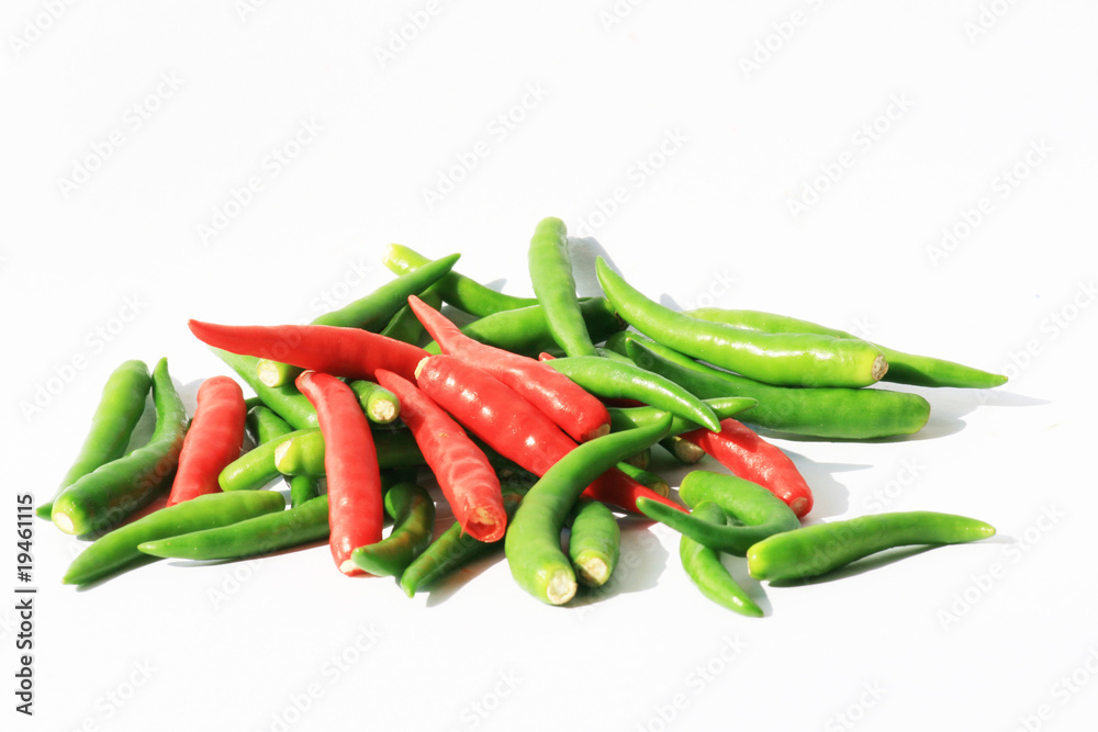 Red and green chili peppers isolated on white, Thailand. Red and green chili peppers isolated on white, Thailand.