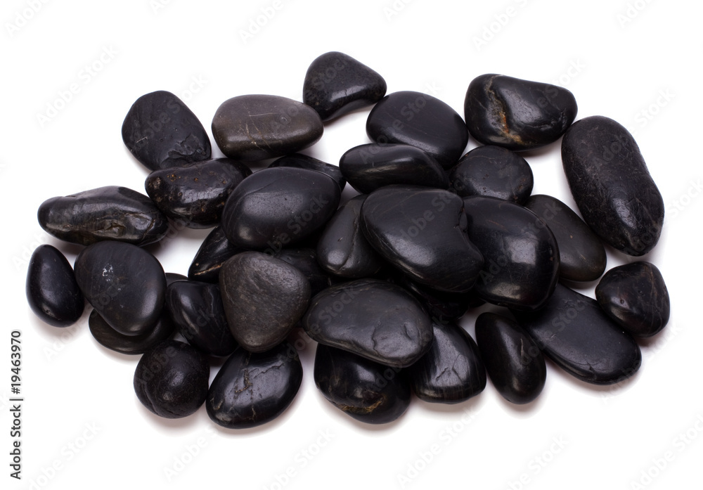 Heap of black pebbles isolated on white background Heap of black pebbles isolated on white background