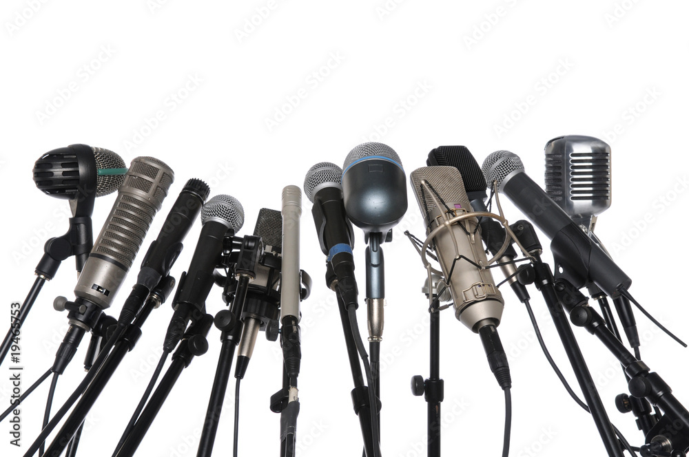 Naklejka premium Microphones Over White Background