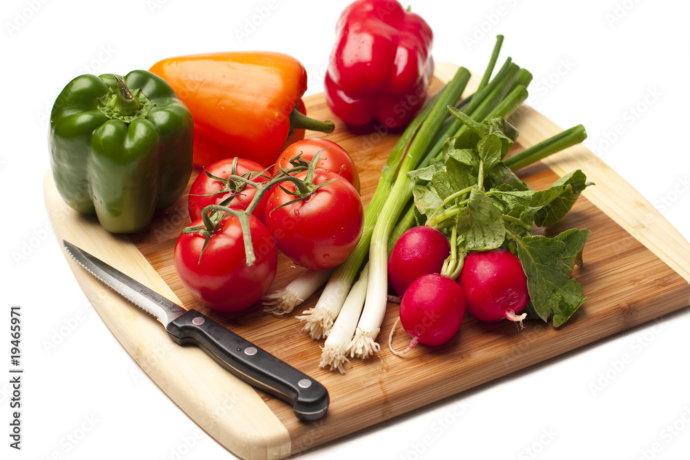 Vegetables on a kitcken bord
