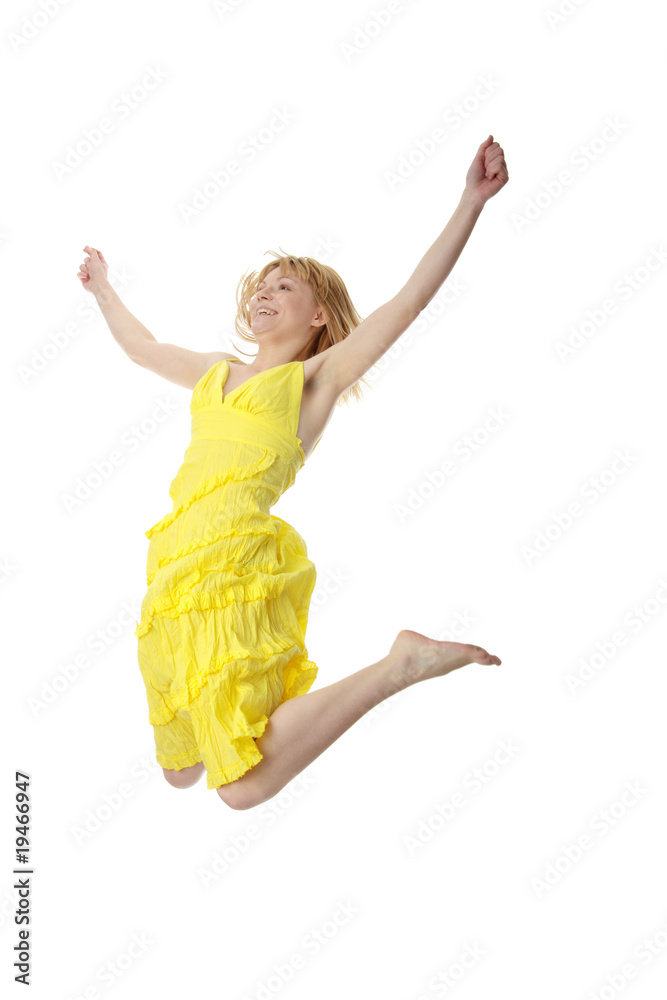 Young smiling woman jumping