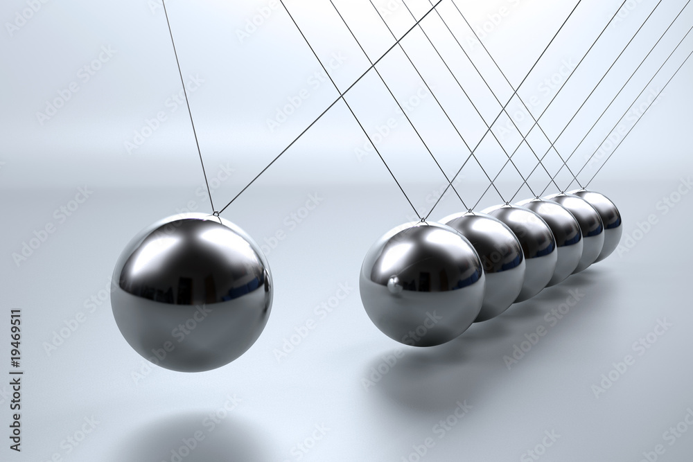 Metal pendulum balls balancing from strings in Newton's cradle Metal pendulum balls balancing from strings in Newton's cradle