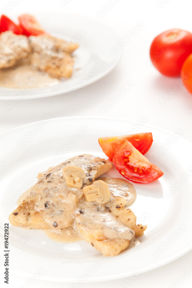 hake fillets with cheese sauce and mushrooms isolated hake fillets with cheese sauce and mushrooms isolated