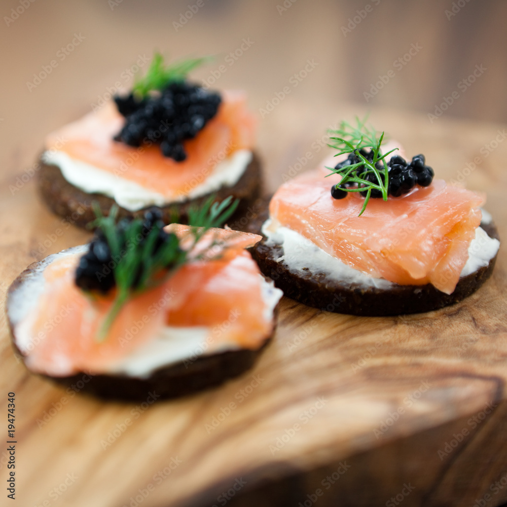 Canapes with salmon and caviar Canapes with salmon and caviar
