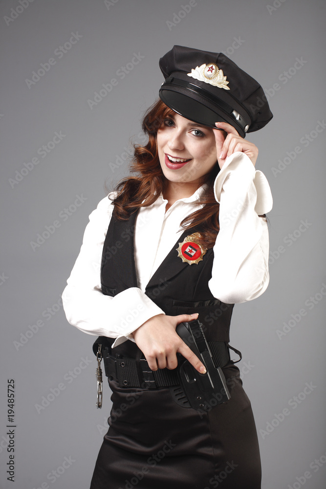 Portrait of a young and sexy officer. Portrait of a young and sexy officer.