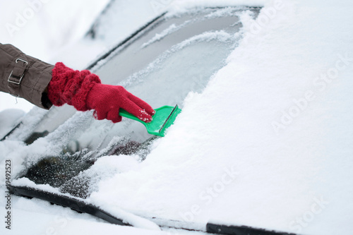Removing Ice and Snow from the Car windshield