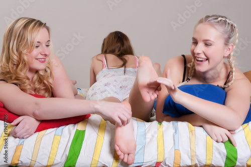 Tickling our girlfriends feet at pyjama party