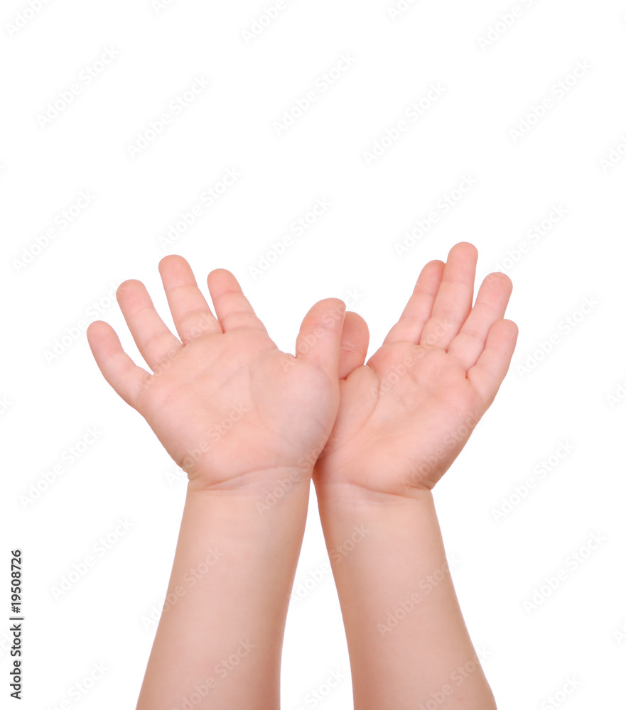 Children's hands palms upwards on white