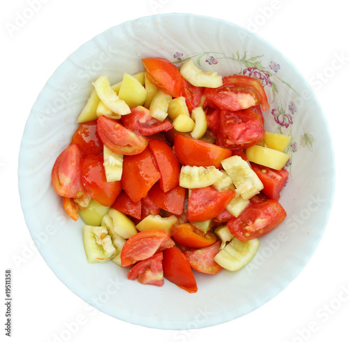 Salad on plate isolated on white