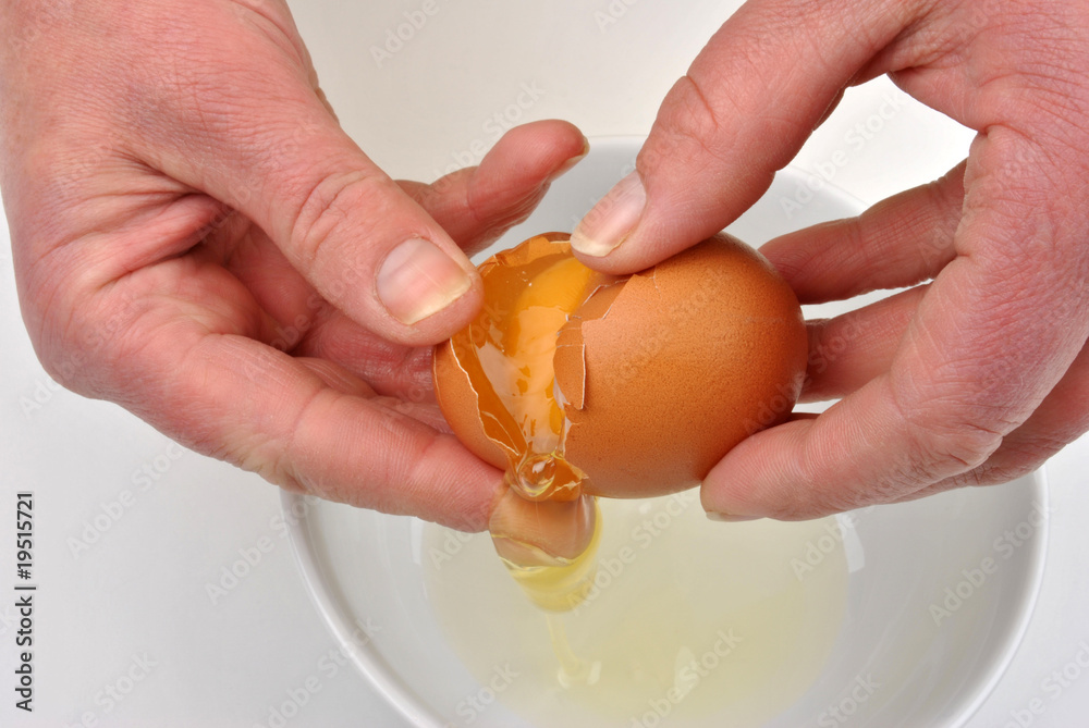 open one organic egg to separate egg yolk open one organic egg to separate egg yolk